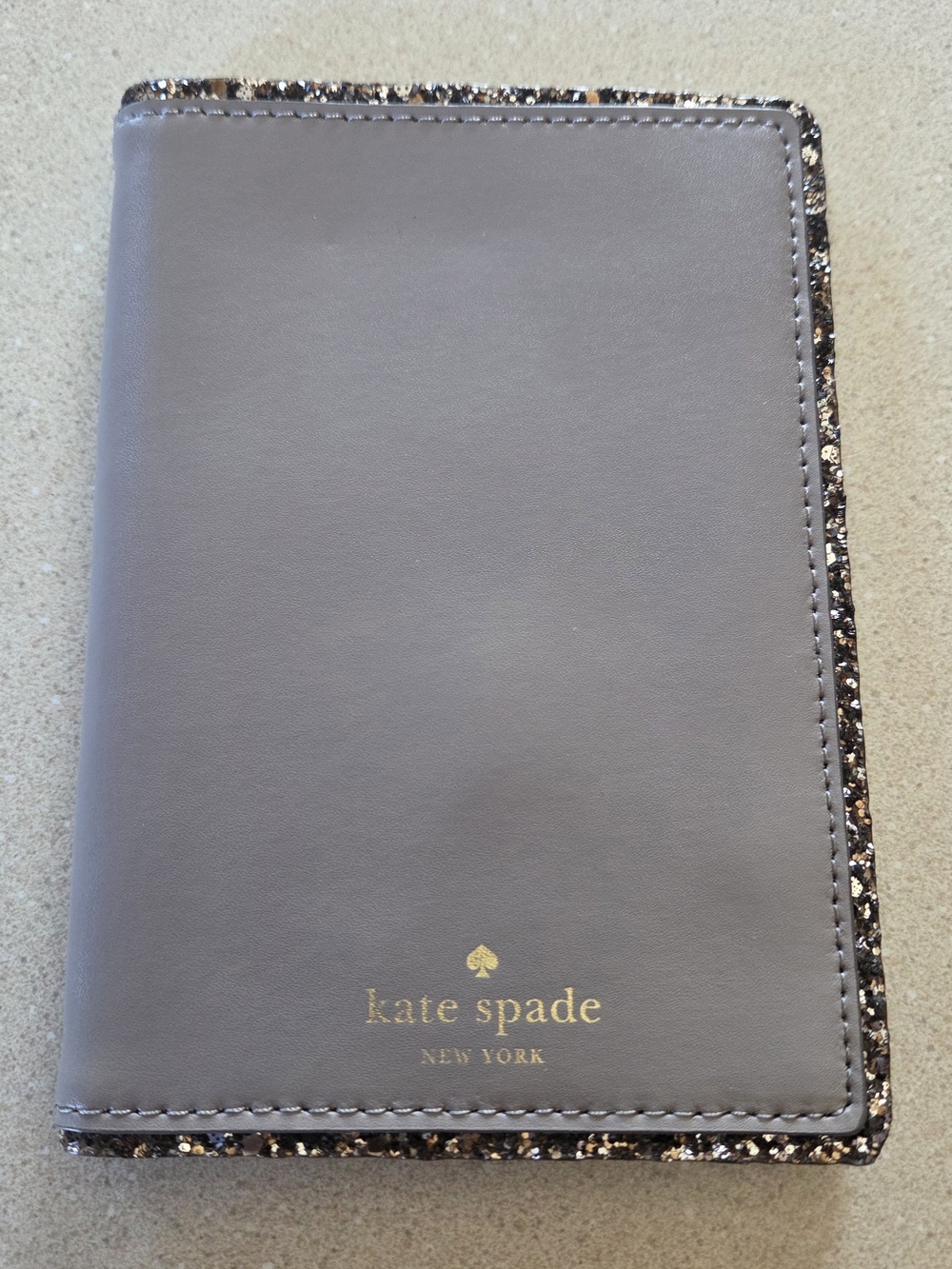 Kate Spade Gray Passport Wallet with Glitter Trim